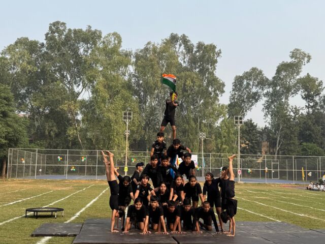 Banyan Tree School students performing gymnastics.
@sourav_01.__

Gymnastics is a vibrant sport that combines strength, flexibility, balance, coordination, and artistic expression. Originating in ancient Greece as a way to prepare soldiers for battle, gymnastics evolved into a competitive sport and now encompasses various disciplines, including artistic gymnastics, rhythmic gymnastics, trampoline, and acrobatics.

Gymnastics offers a wide range of physical, mental, and social benefits, making it an excellent activity for overall development.

Physical Benefits

1. *Improved Strength and Flexibility*: Gymnastics develops muscle strength and enhances overall flexibility.
2. *Enhanced Balance and Coordination*: The sport trains the body to maintain stability and move fluidly.
3. *Increased Endurance*: Rigorous routines build cardiovascular and muscular endurance.
4. *Bone Health*: Weight-bearing activities strengthen bones, reducing the risk of osteoporosis.
5. *Posture and Body Awareness*: Gymnastics promotes proper posture and awareness of body positioning.

Mental Benefits

1. *Discipline and Focus*: Training instills discipline, concentration, and a strong work ethic.
2. *Confidence and Self-Esteem*: Successfully mastering skills boosts self-confidence.
3. *Stress Relief*: Physical activity and artistic expression help reduce stress and improve mental well-being.

#banyantree #banyantreeschool #banyantreeschooldelhi #banyantreeschoollodhiroad #sportday #sportdays #sports #students #performer #performance #letsbehealthytogether #letsbehealthy #fitnessmotivation #fitness